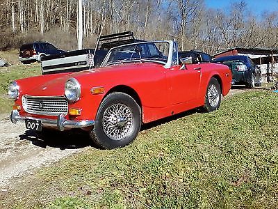 MG : Midget  2 door Runs and drives comes with  hard top  and  soft top