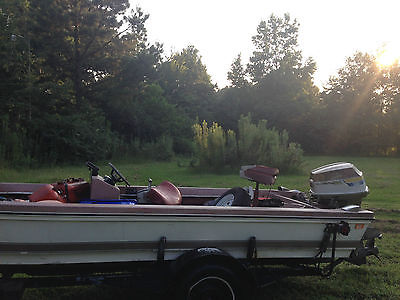 bass boat and trailer with motor