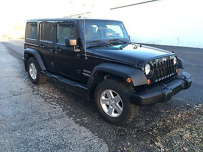 2011 Jeep Wrangler Unlimited Sport Sport Utility 4-Door 2011 Jeep Wrangler Unlimited Sport 4 Door 4x4 NICE TIRES NEW BATTERY NEW TOP