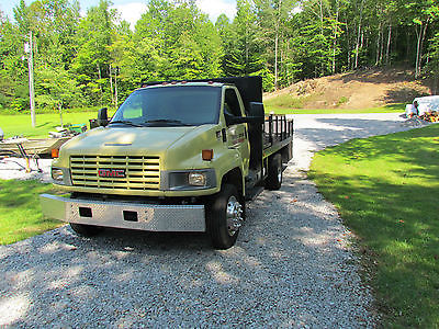 GMC C5500 truck w/asphalt sealing unit