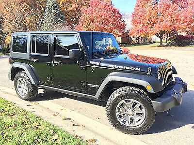 2016 Jeep Wrangler Unlimited Rubicon Sport Utility 4-Door 2016 Jeep Wrangler Rubicon Unlimited 4dr 4x4 Black on Black one owner 7k Miles