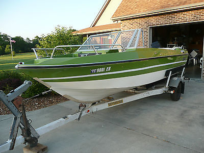 18 FT. Larson boat with 75 HP Mercury motor and trailer.