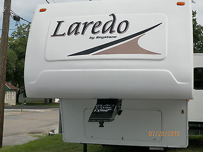 LOCAL 2005 KEYSTONE LAREDO 29 FT. RTH WHEEL WITH SUPER SLIDE