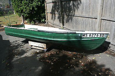Green aluminum fishing boat, 12 ft, 3 bench seats