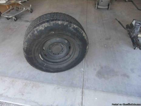 16 inch 8 lug wheel and tire, 0