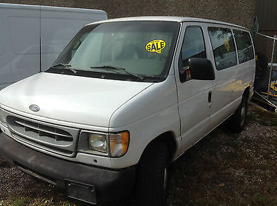 Ford : E-Series Van 2 door in front/2 in back Ford Econoline 250 series.  Color white work horse