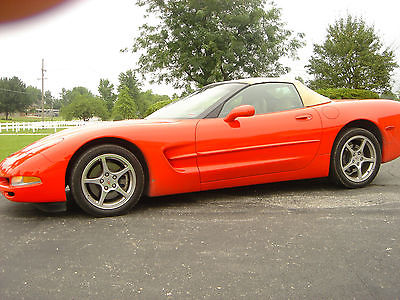 Chevrolet : Corvette C5 CONVERTIBLE / Roadster - TORCH RED with Tan top and interior.