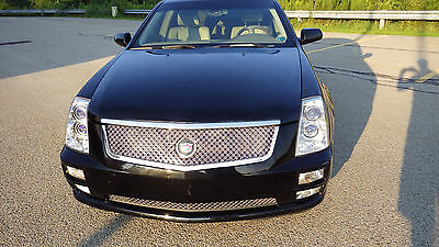 Cadillac : STS Luxury  Black Cadillac STS 2005 Tan Interior, come over to test drive the car