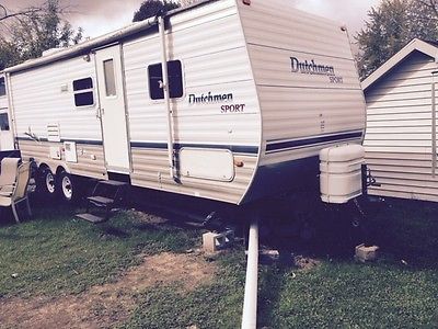 travel trailer+slideout+Awning+Queen Bed+4 bunks in rear bedroom+free storage