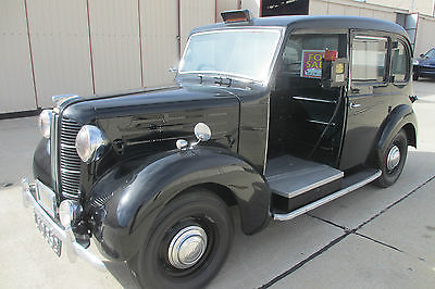 Austin : FX3 LONDON TAXI FX3 LONDON TAXI OTHER MAKES 1951 AUSTIN  LONDON TAXI 3 DOOR OPEN LUGGAGE COMPARTMENT WITH METER