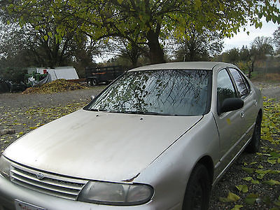 Nissan : Altima 4 doors sedan 1997 nissan altima gle light brown good running condition 4 cyc