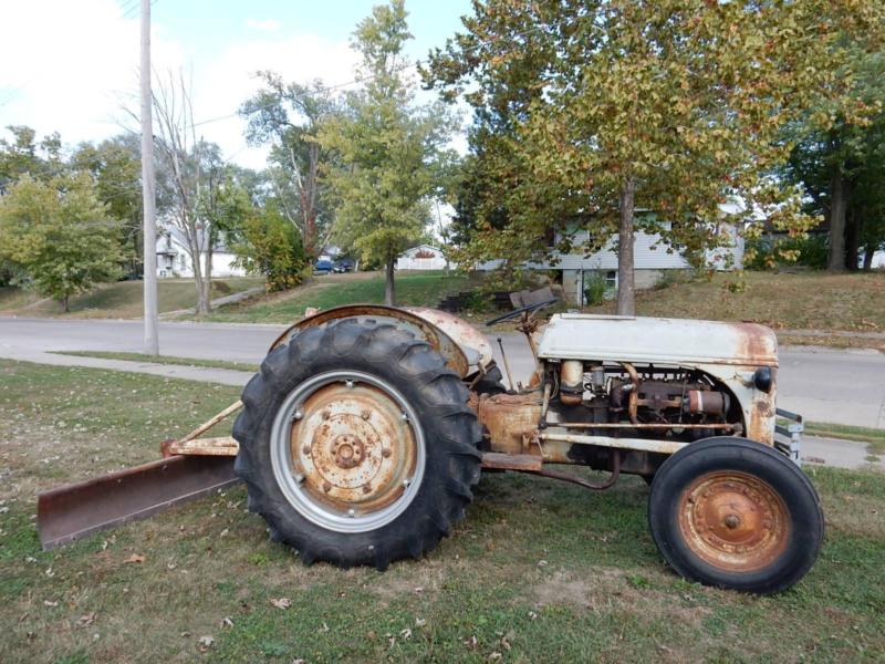9N Ford Tractor Good Condition With Chains and Rear Blade