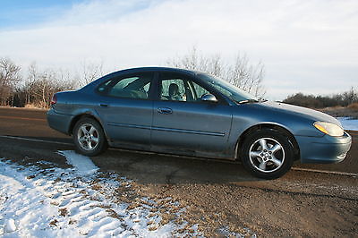 Ford : Taurus 3 liter v 6 auto trans runs well registered alberta at present