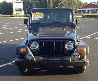1997 Jeep Wrangler 6cyl 4L includes 3 tops