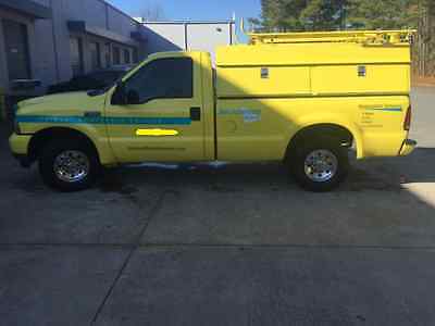 Ford : F-250 ServiceMaster Restoration Fleet 2004 Ford F-250 with Reading Service body Yellow