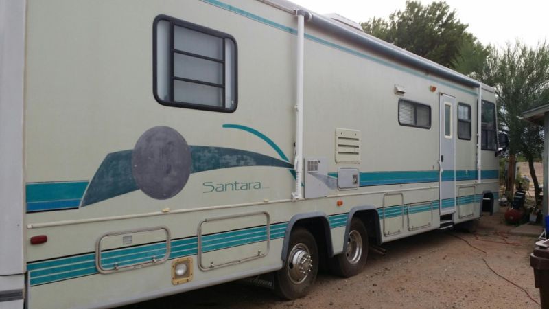 1995 COACHMAN SANTARA 36' W/ SUPER SLIDE