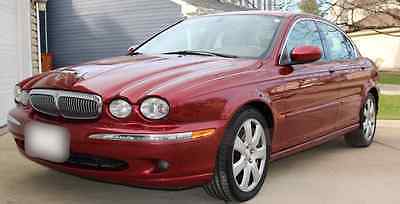 Jaguar : X-Type Base Sedan 4-Door 2004 jaguar x type red awd 96 k runs great all the options priced right