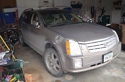 Cadillac : SRX 4dr V6 SUV 2006 cadillac srx awd for repair or parts bad timing chain out des moines ia