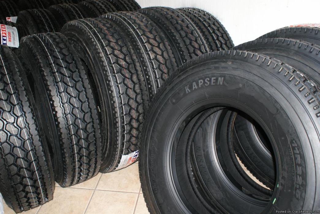 TRUCK TIRES BRAND NEW WITH WARRANTY, 1