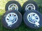 set of ford tires & rims w/center  caps, 0