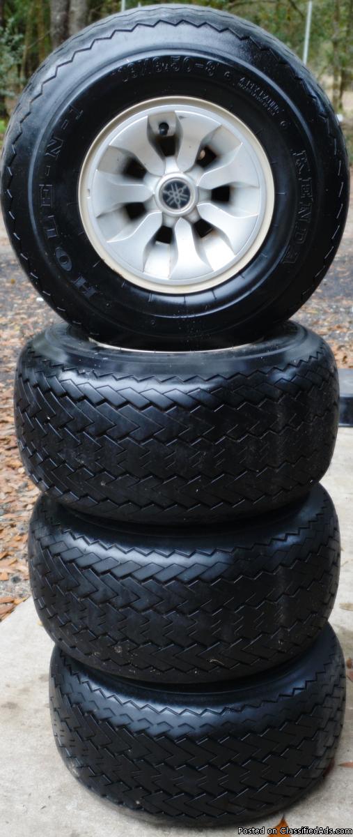 HARDLY USED GOLF CART TIRES MOUNTED ON RIMS