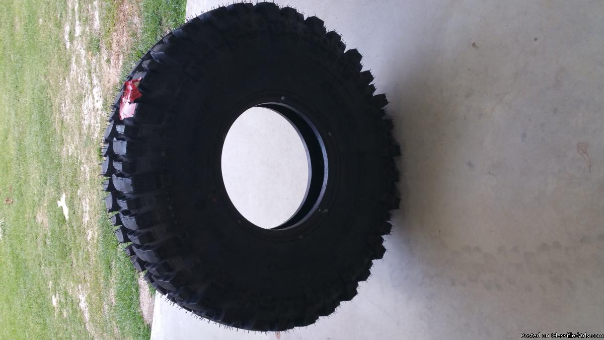 boggers 38 1/2  by 11.00 brand new never been on rims, 0