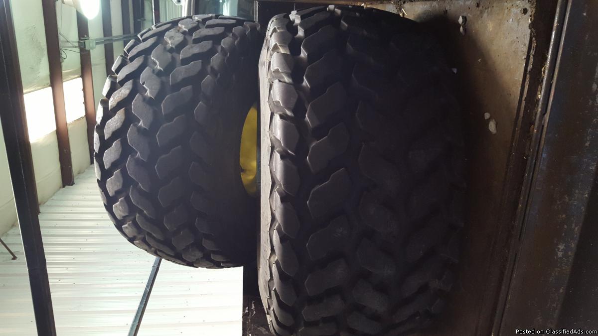 Two Farm turf tires with John deer with 8 hole wheels, 1