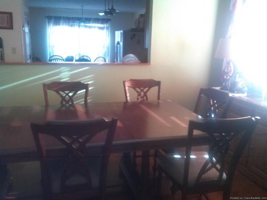Dining table and 8 chairs, 1