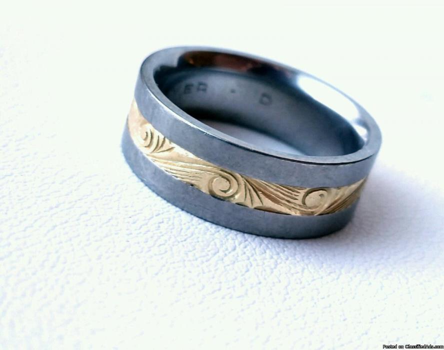 Men's ring ( Jewelry )  Size 8 Titanium with 18 karat gold inlay.