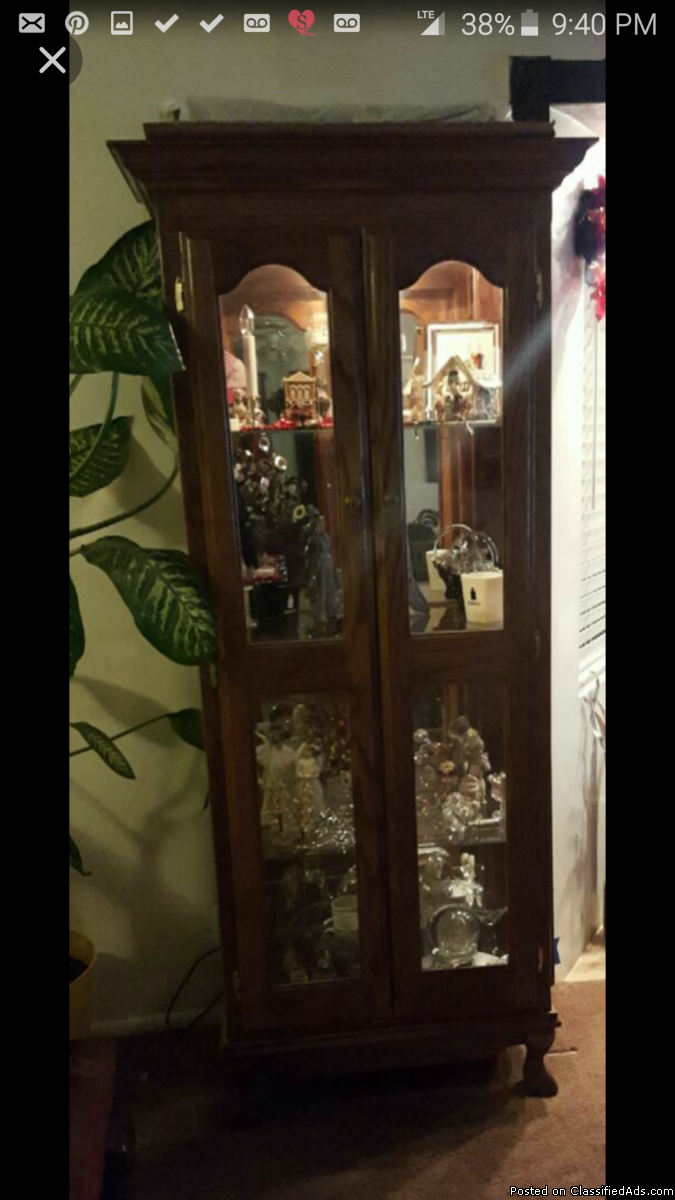 Curio cabinet. Lighted, mirrored back. 74 1/2