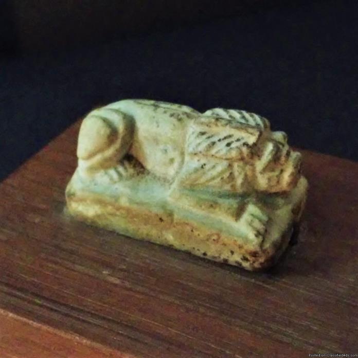 An Egyptian Blue Green Faience Lion Amulet, Late Dynastic to Ptolemaic Period