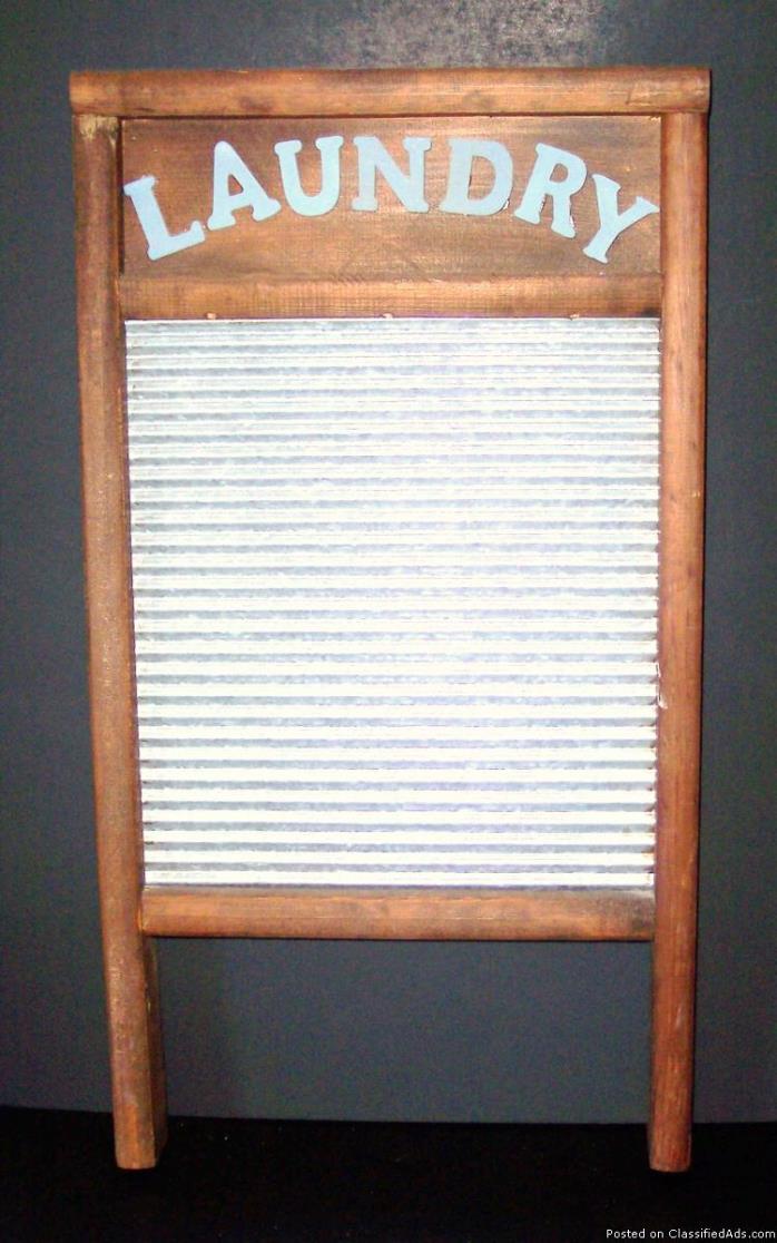Vintage Washboard Wooden Frame Zinc Board with Blue Letters saying Laundry.