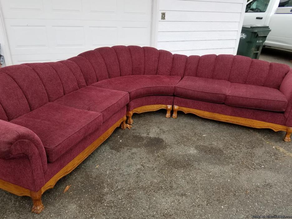 9' half moon sofa..color is in between purple and mauve in great condition