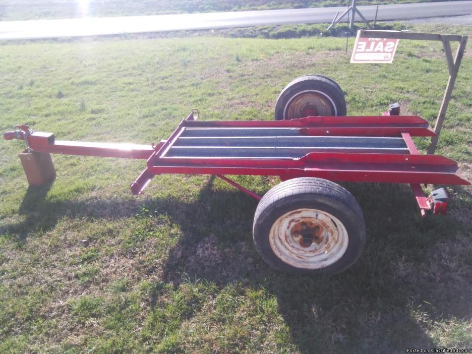 This is a lawn mower tilt trailer fits up to lawn mowers up to 50 inch cut 8...
