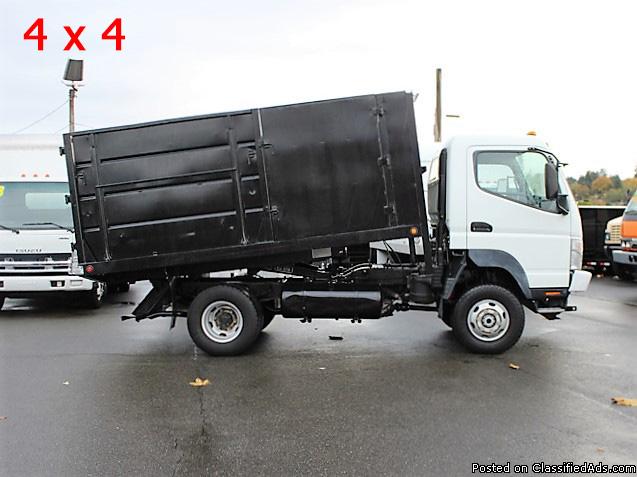 #6029: 2006 MITUSIBHSI FUSO FG140 4x4 12 Ft. Flatbed Dump Truck