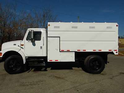 1997 International 4700  1997 Chipper Truck Used DT466E 6 CYL TURBO DIESEL Automatic Diesel White