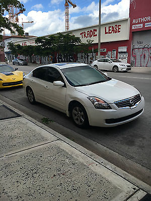 2009 Nissan Altima Leather 2009 USED White Nissan Altima 2.5 SL auto trans cold A/C leather interior