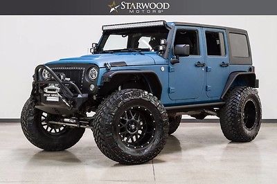 2011 Jeep Wrangler Unlimited Rubicon Sport Utility 4-Door Rubicon Express Teraflex Fox Suspension Protective Finish 20 Wheels 40 Tires