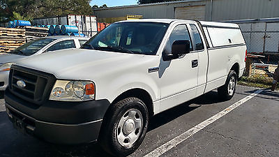 2007 Ford F-150 4X2 Cab Ford F-150 XL, V6, 8' Bed, with Topper (with work cabinet)