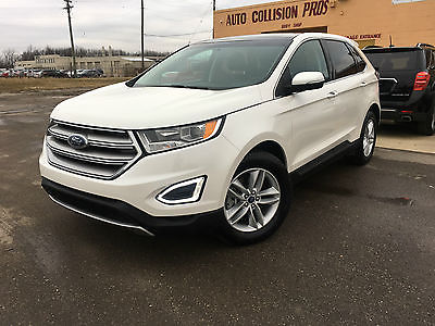 2015 Ford Edge SEL AWD ecoboost 2015 Ford Edge SEL AWD ecoboost leather navigation panoramic rebuilt title !!