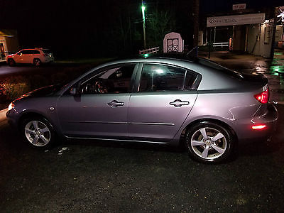 2006 Mazda Mazda3 3 2006 MAZDA 3I 4 DOOR 237,000 MILES RUNS GOOD BUT NEED WORK GREY