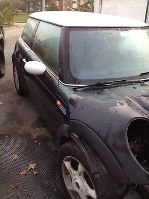 2002 Mini Cooper Base Hatchback 2-Door i believe car is totaled   Probably last listing, parting  out  to follow