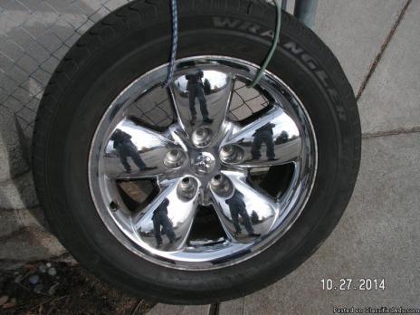 275/60 R20 Goodyear tires/chrome Dodge wheels 5-5 1/2