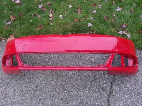 Red 2012 VW Jetta Front bumper cover