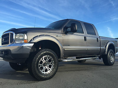 Ford : F-250 XLT **MUST SEE** 2002 F250 CREW XLT 4X4 TV/DVD LEATHER 7.3 POWERSTROKE TURBO DIESEL