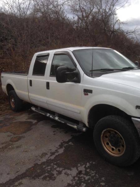 2001 ford F250 XLT 4x4 crew cab w/8.6 fisher V extreme plow