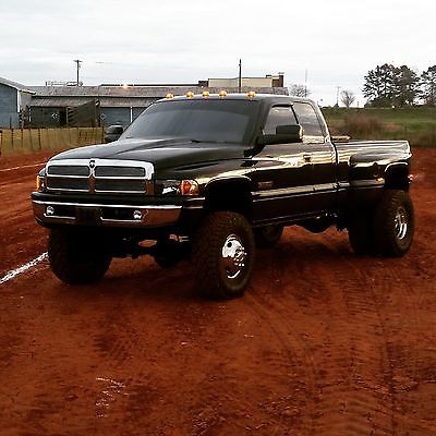 Ram : 3500 Cummins 1999 lifted cummins dually 5 speed built