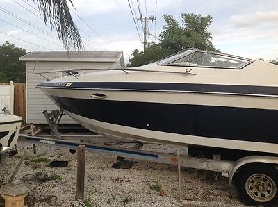 24' wellcraft cabin cruiser on tandem axle aluminum trailer