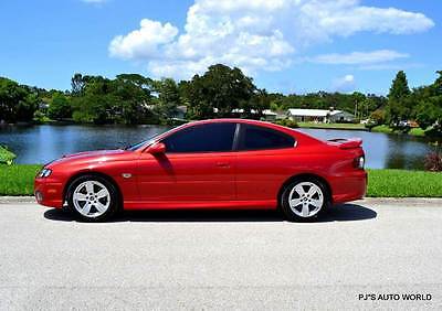 2006 Pontiac GTO Base 2dr Coupe 2006 Pontiac GTO Base 2dr Coupe 83,446 Miles Spice Red Metallic Coupe 6.0L V8 Ma