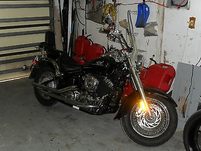2003 Yamaha V Star  black,windshield,straight pipes,excellent condition only 2500 miles like new